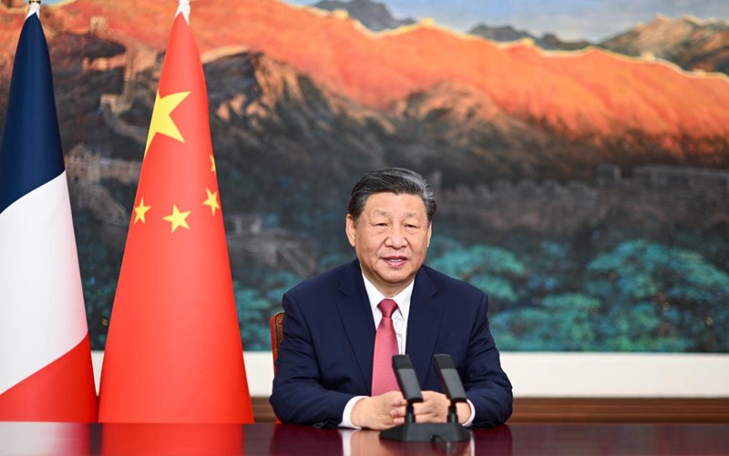 Rais wa China Xi Jinping akitoa hotuba ya video kwenye mapokezi ya kuadhimisha miaka 60 tangu kuanzishwa kwa uhusiano wa kidiplomasia kati ya China na Ufaransa mjini Beijing, China, Januari 25, 2024. (Xinhua/Li Xueren)